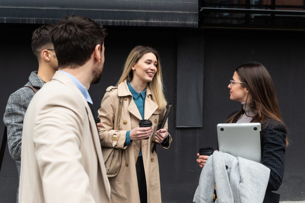 A group of marketing experts standing.
